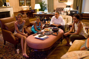  President Barack Obama and first lady Michelle Obama with their daughters Sasha and Malia watch the World Cup soccer game between the U.S. and Japan