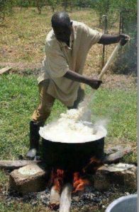 african-man-cooking